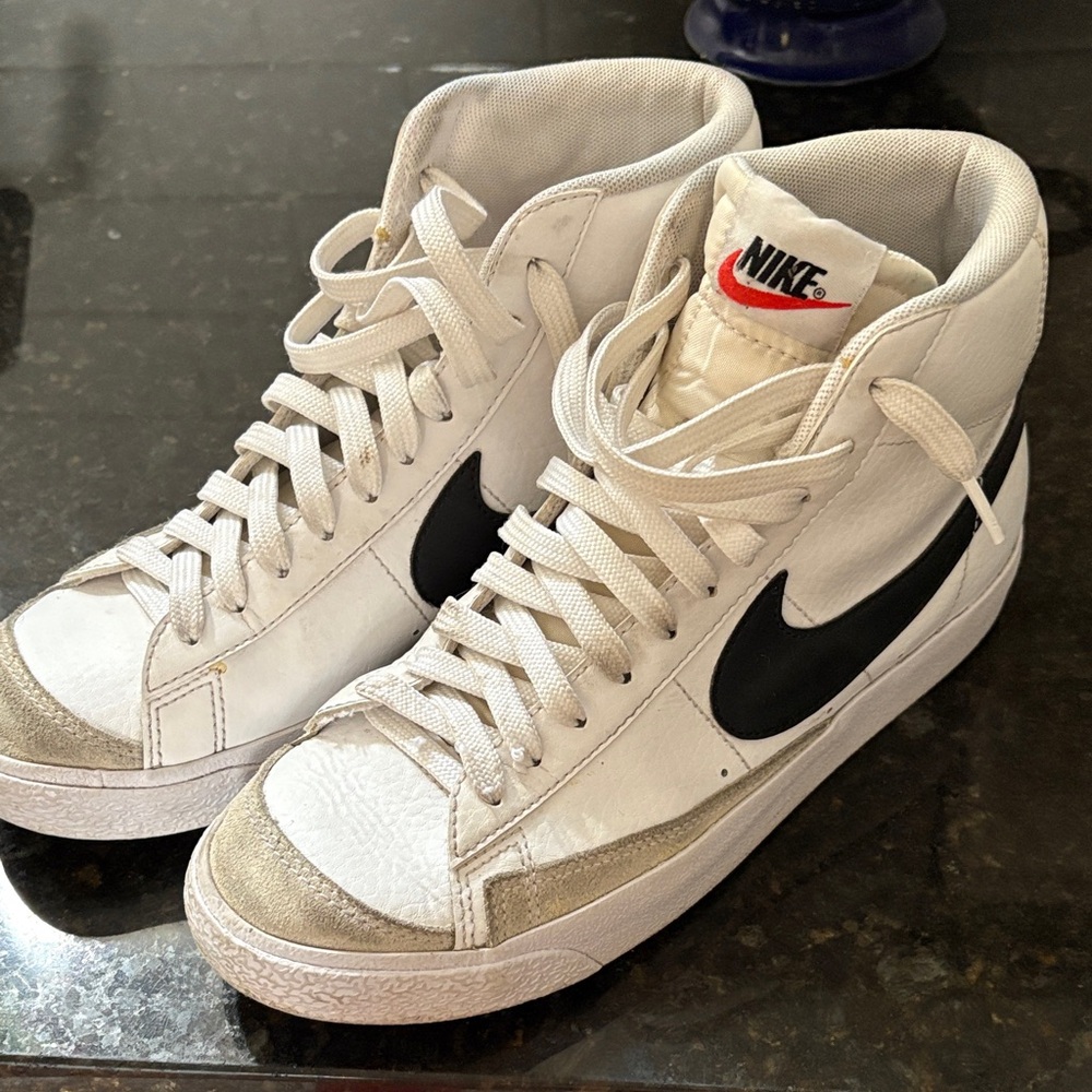 Nike White and Black High-Top Sneakers.